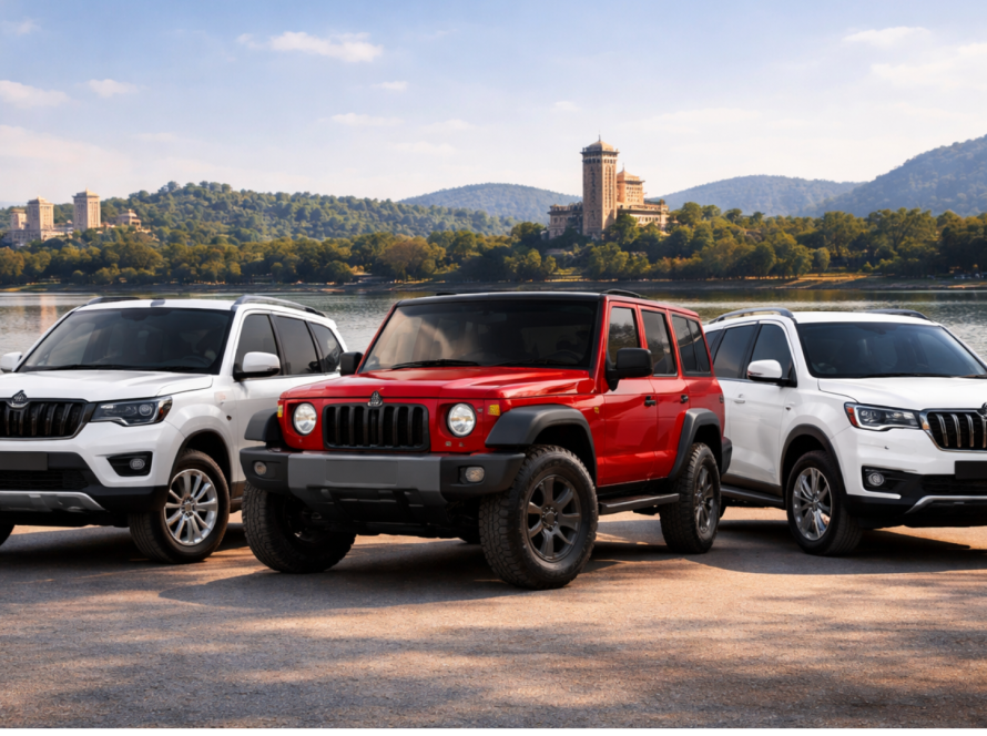 Mahindra Scorpio, Thar and XUV700 self drive cars parked near Sukhna Lake in Chandigarh with scenic lake and hills background